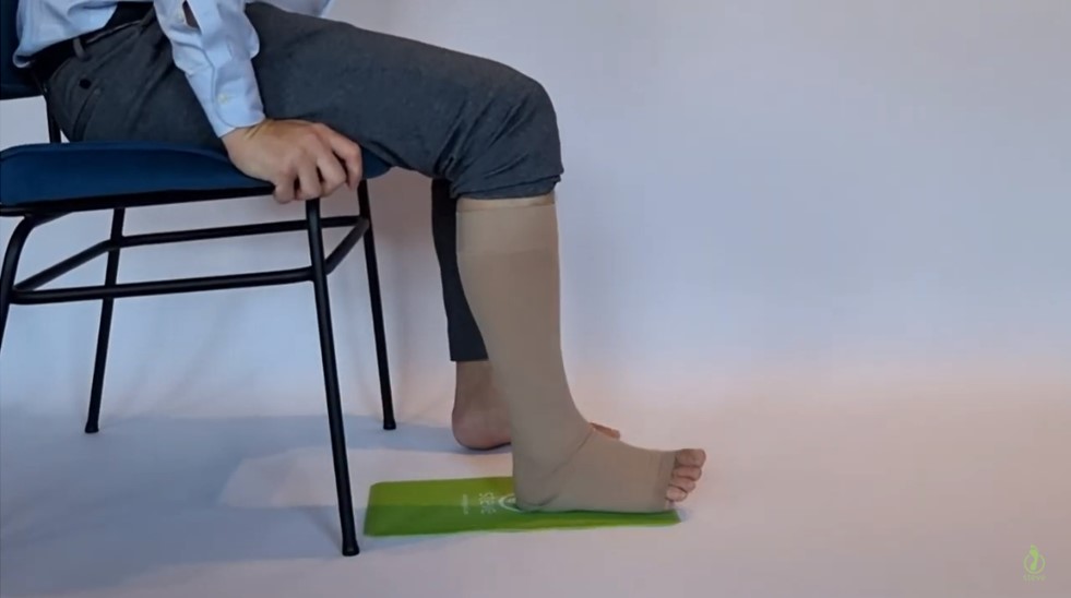 Man uses Steve Mat to position the heel of the stocking
