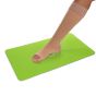 Foot with support stocking on a green Steve Mat anti-slip mat